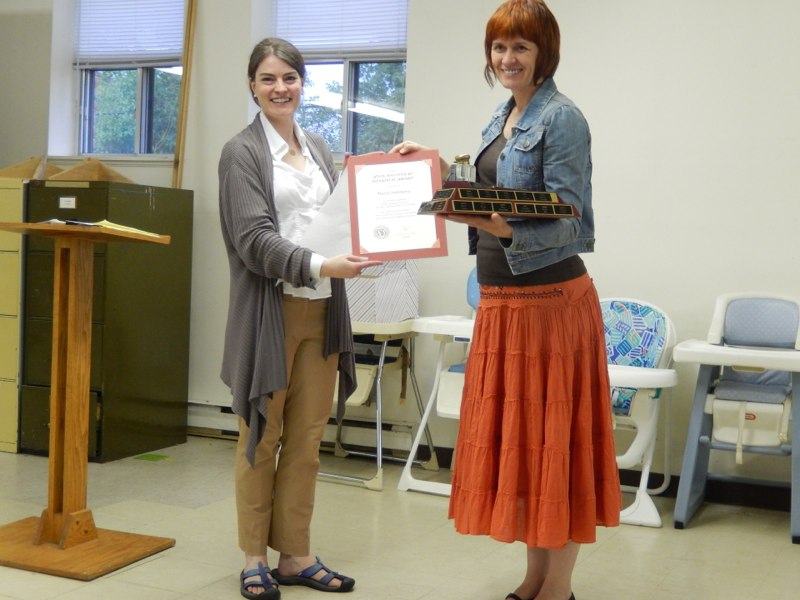 CSO member Marta Stojanovic (right) presented with the John Whitehead award by co-president Alison Peters
