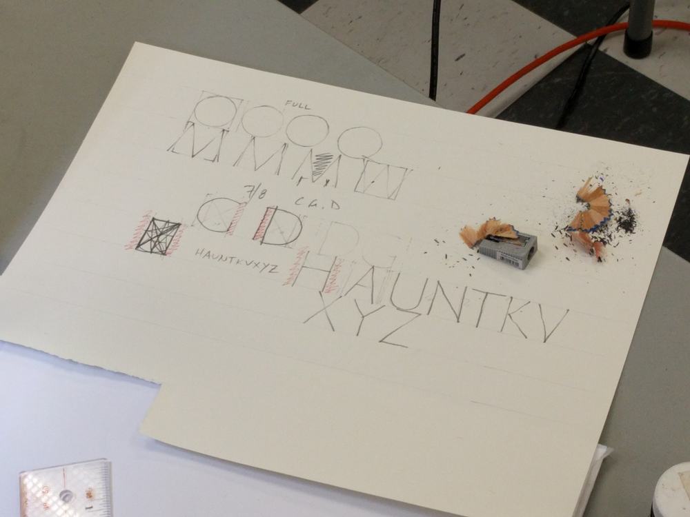 A sample sheet used by the instructor to demonstrate proper proportions of Roman skeletal letters using pencil